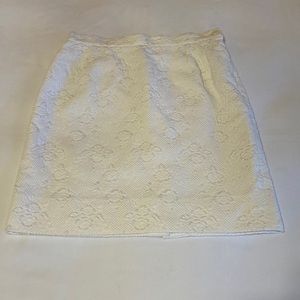 Yves Saint Laurent white skirt with stunning detail.